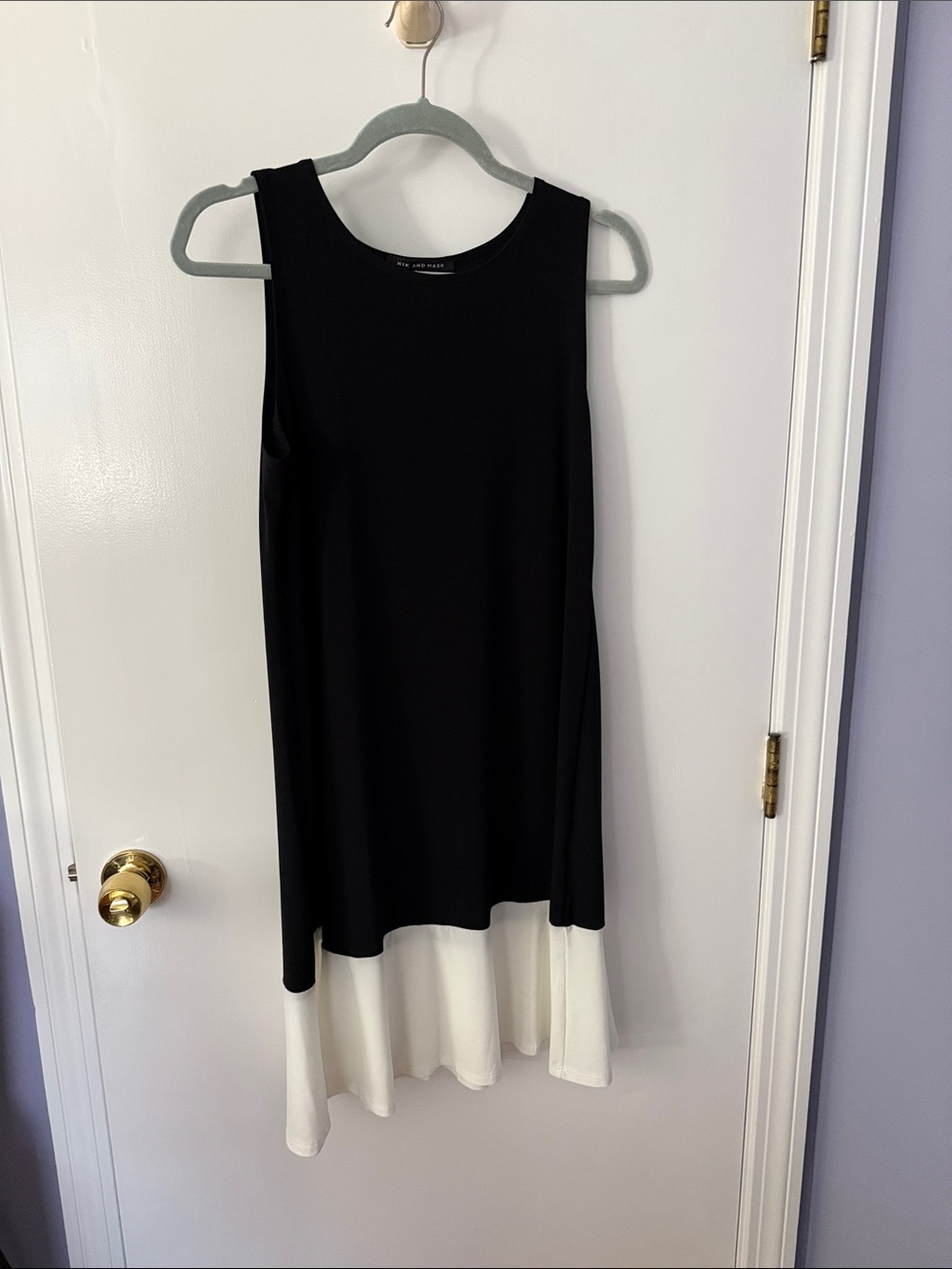 Black Sleeveless Contrast-Hem Dress with White Flounce